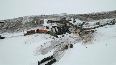 This photo provided by Joshua Henderson shows a Canadian Pacific train derailed in rural North Dakota on Sunday, March 26, 2023, which spilled hazardous materials, but local authorities and the railroad said there is no threat to public safety.