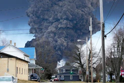 A black plume rises over East Palestine, Ohio, as a result of a controlled detonation of a portion of the derailed Norfolk Southern trains, Feb. 6, 2023.