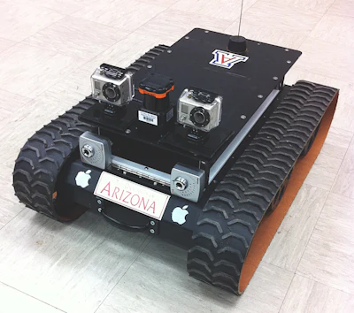 One of the experimental rovers used by Fink's team to test hardware and software related to autonomous exploration. This prototype is outfitted with cameras and other sensors for navigation.