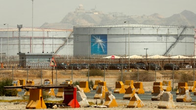 Storage tanks are seen at the North Jiddah bulk plant, an Aramco oil facility, in Jiddah, Saudi Arabia, on March 21, 2021. Oil giant Saudi Aramco said Sunday, March 12, 2023, it earned a $161 billion profit last year, attributing its earnings to higher crude oil prices.