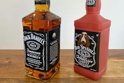 A bottle of Jack Daniel's Tennessee Whiskey is displayed next to a Bad Spaniels dog toy in Arlington, Va., Nov. 20, 2022.