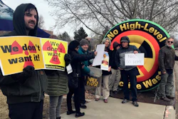 Brendan Shaughnessy, left, with the Nuclear Issues Study Group, protests with other activists ahead of a meeting of a U.S. Nuclear Regulatory Commission panel in Albuquerque, N.M., on Tuesday, Jan. 22, 2019.