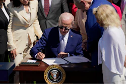President Joe Biden signs into law H.R. 4346, the CHIPS and Science Act of 2022, at the White House in Washington, Aug. 9, 2022. Biden is set to tour a clean energy technology manufacturer in Minneapolis on Monday, April 3, 2023, as part of his effort to highlight his investment agenda ahead of an expected reelection campaign. ()