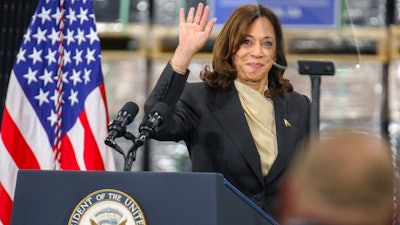 Vice President Kamala Harris waves to the audience during her visit to the Qcells solar plant in Dalton, Ga. Thursday, April 6, 2023.