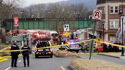 Emergency personnel at the site of a deadly explosion at a chocolate factory in West Reading, Pa., March 25, 2023.