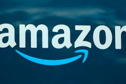 An Amazon logo appears on a delivery van, Oct. 1, 2020, in Boston. Amazon’s total injury rate for warehouse workers took a dip last year, but injuries were still worse than they were in 2020, according to an analysis released Wednesday, April 12, 2023, by a coalition of labor unions.