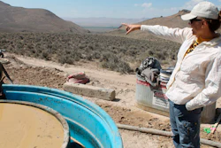 Melissa Boerst, a Lithium Nevada Corp. geologist, points to an area of future exploration from a drill site at the Thacker Pass Project in Humboldt County, Nev., Sept. 13, 2018.