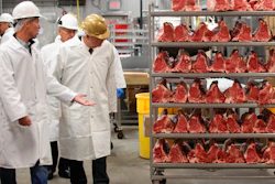 U.S. Agriculture Secretary Tom Vilsack, center, tours the Greater Omaha Packing beef processing plant in Omaha, Neb., on Nov. 2, 2022.