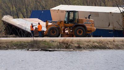 Recovery work is shown at the scene of a train derailment along Hwy 35 Thursday, April 27, 2023 in Crawford County just south of DeSoto, Wis.