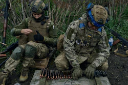 Ukrainian soldiers prepare their ammunition at the frontline positions near Vuhledar, Donetsk region, Ukraine, Monday, May 1, 2023.