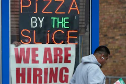 A hiring sign displayed at a restaurant in Prospect Heights, Ill., April 4, 2023.