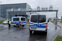 Police emergency vehicles are parked at a Mercedes-Benz plant in Sindelfingen, Germany, Thursday May 11, 2023.