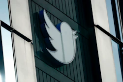 A Twitter logo hangs outside the company's offices in San Francisco, Dec. 19, 2022. Elon Musk said Thursday, May 11, 2023, that he has found a new CEO for Twitter, or X Corp. as it is now called.