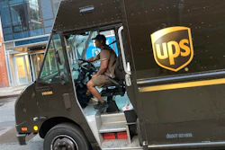 A United Parcel Service driver pilots his truck, in New York, Thursday, May 11, 2023.