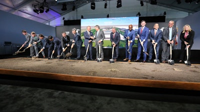 Chung Eui-sun, center left, executive chairman of Hyundai Motor Group, shakes hands with Georgia Gob. Brian Kemp as dignitaries join in for the official groundbreaking ing for the Hyundai Meta Plant, Oct. 25, 2022, in Ellabell, Ga. Hyundai and LG Energy Systems say they will build a $4.3 billion electric battery plant in Georgia. The factory would be on the site of the new electric vehicle assembly plant that Hyundai Motor Group is building near Savannah. The companies will split the investment, starting production as early as late 2025.
