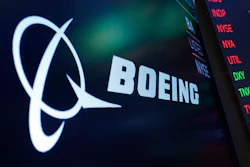 The logo for Boeing appears on a screen above a trading post on the floor of the New York Stock Exchange, July 13, 2021.