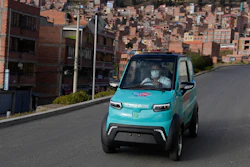 Dr. Carlos Ortuno drives a Bolivian-made, Quantum electric car to a house call, in La Paz, Bolivia, Wednesday, May 3, 2023.
