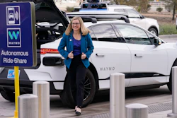 Phoenix Mayor Kate Gallego arrives in a self-driving vehicle, Friday, Dec. 16, 2022, at the Sky Harbor International Airport Sky Train facility in Phoenix.