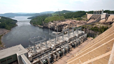 A dam generates power along the Manicouagan River north of Baie-Comeau, Quebec, June 22, 2010.