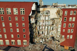 An apartment building that partially collapsed two days earlier can be seen Tuesday, May 30, 2023, in Davenport, Iowa.