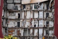 Seen is the damage from a collapsed apartment building, Monday, June 5, 2023, in Davenport, Iowa.