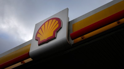 A sign at a Shell petrol station in London, Thursday, Feb. 2, 2023. Shell has effectively abandoned a plan to cut oil production by 1-2% per year until the end of the decade and instead maintain it at current levels, in a move that risks angering climate activists.