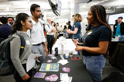 Georgia State University students Kavita Javalagi, left, and Gana Natarajan, second from left, speak with Shetundra Pinkston, during the Startup Student Connection job fair, Wednesday, March 29, 2023, in Atlanta. For the thousands of workers who'd never experienced upheaval in the tech sector, the recent mass layoffs at companies like Google, Microsoft, Amazon and Meta came as a shock. Now they are being courted by long-established employers whose names aren't typically synonymous with tech work, including hotel chains, retailers, investment firms, railroad companies and even the Internal Revenue Service.