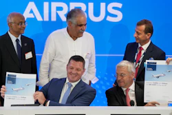 CEO of IndiGo Pieter Elbers, bottom left, Airbus Chief Commercial Officer and Head of International Christian Scherer, borrom right, Chairman and Non-Executive Independent Director of IndiGo Dr. Venkataramani Sumantran, left, Promoter & Managing Director of IndiGo Rahul Bhatia, centre, and Airbus CEO Guillaume Faury pose for a picture with signed documents during a news conference during the Paris Air Show in Le Bourget, north of Paris, France, Monday, June 19, 2023.