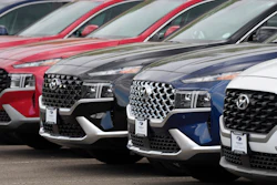 A line of 2022 Santa Fe SUV's sit outside a Hyundai dealership Sunday, Sept. 12, 2021, in Littleton, Colo. Nearly three months after Hyundai and Kia rolled out new software designed to thwart rampant auto thefts, crooks are still driving off with the vehicles at an alarming rate. (AP Photo/David Zalubowski