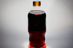 A bottle of soda is photographed in Washington, Jan. 23, 2014.