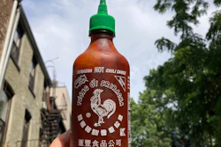 A bottle of Sriracha chili sauce shown in New York, July 13, 2023.
