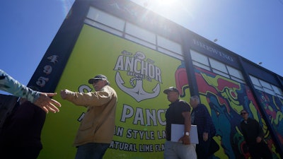 People in line outside Anchor Public Taps in San Francisco, July 13, 2023.