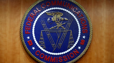 The seal of the Federal Communications Commission (FCC) is seen before an FCC meeting to vote on net neutrality in Washington, Dec. 14, 2017.