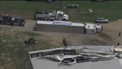 A truck is overturned and the Pfizer plant is damaged after severe weather passed the area on Wednesday, July 19, 2023 in Rocky Mount, N.C.