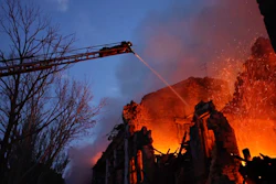 Emergency personnel work at the scene of a destroyed residential area in Mykolaiv, Ukraine, July 20, 2023.