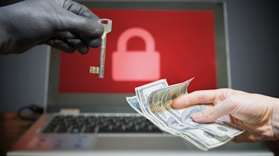 Computer Security And Hacking Concept Ransomware Virus Has Encrypted Data In Laptop Hacker Is Offering Key To Unlock Encrypted Data For Money 684726904 2130x1411 (1)