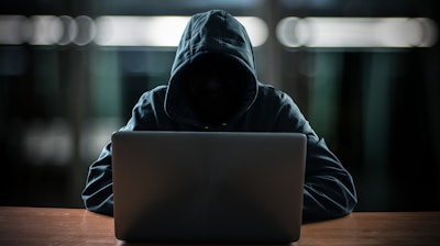 Hacker In Front Of His Computer 583818378 2142x1404
