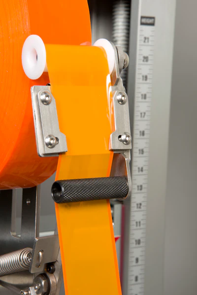 The specially designed tape head folds the edges of the tape under to create a non-sticky edge that both strengthens the tape and allows knifeless carton opening.