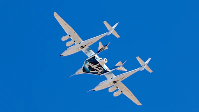 Virgin Galactic's VSS Unity departs Mojave Air & Space Port in Mojave, Calif., for the final time as Virgin Galactic shifts its SpaceFlight operations to New Mexico, Feb. 13, 2020.