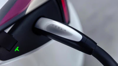 This photo provided by Tesla shows the North American Charge Standard, or NACS, a once-exclusive plug to Tesla that other automakers are now adopting.