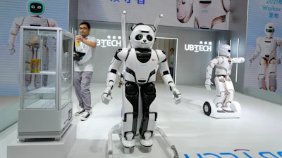 A panda shaped robot is prepared for a demonstration at the annual World Robot Conference at the Beijing Etrong International Exhibition and Convention Center in Beijing, Wednesday, Aug. 16, 2023.