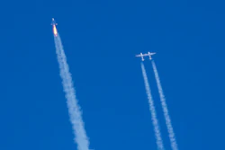 Virgin Galactic's rocket-powered plane Unity 22, left, flies past its mothership Eve on its way to the edge of space after taking off from Spaceport America, near Truth or Consequences, N.M., Thursday, Aug. 10, 2023.