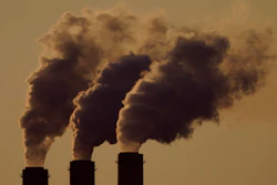 Emissions rise from the smokestacks at the Jeffrey Energy Center coal power plant as the suns sets, near Emmett, Kan., Sept. 18, 2021.
