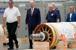 President Joe Biden and Mark Obradovich, Managing Director, Ingeteam, Inc., left, and others arrive at Ingeteteam Inc., in Milwaukee, Tuesday, Aug. 15, 2023.
