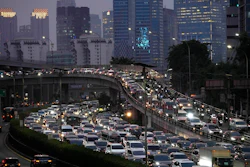 Cars and motorbikes are caught in rush hour traffic at the main business district in Jakarta, Indonesia, Tuesday, Aug. 15, 2023.