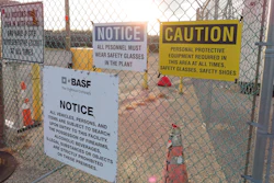 A gate at the entrance to the former Ciba Geigy chemical plant in Toms River, N.J. is filled with warnings in this Jan. 24, 2023 file photo regarding the contaminated area, which is on the Superfund list of the nation's worst toxic waste sites.