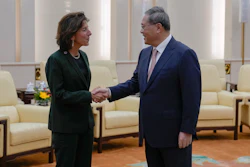 U.S. Commerce Secretary Gina Raimondo, left, is greeted by Chinese Premier Li Qiang at the Great Hall of the People in Beijing, Tuesday, Aug. 29, 2023.