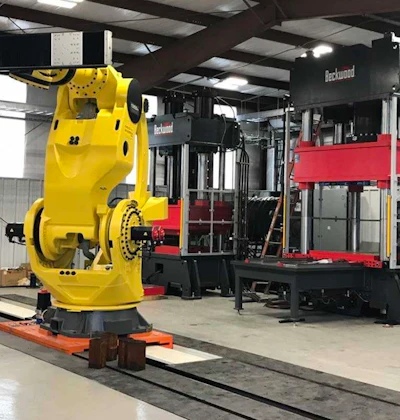 This Rollon steel RTU supports the FANUC M2000 on a sub-floor, drive-over installation.