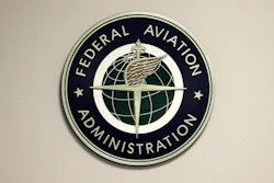 A Federal Aviation Administration sign hangs in the tower at John F. Kennedy International Airport in New York, March 16, 2017.