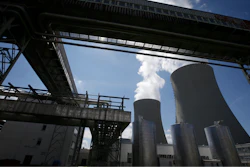 Equipment frames the cooling towers of the Temelin nuclear power plant near the town of Tyn nad Vltavou, Czech Republic, on Thursday, June 25, 2015.